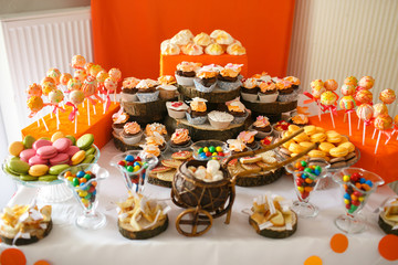 stylish luxury decorated orange candy bar for the celebration of