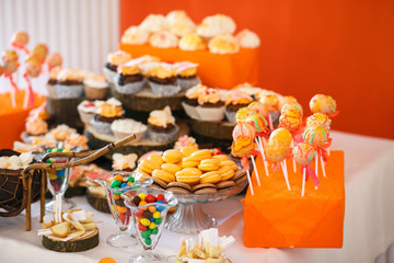 stylish luxury decorated orange candy bar for the celebration of