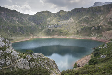 Views of Lago de la Cueva (Lake of the Cave) in Saliencia Valley, Somiedo Nature Reserve. It is located in the central area of the Cantabrian Mountains,  Asturias, Spain