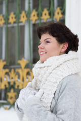 Young pretty woman portrait outdoors in winter