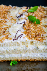 Cake with creamy cream and nuts