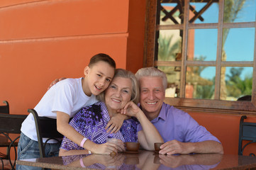 Happy family at breakfast