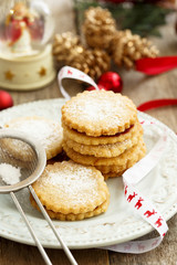 Sandwich cookies with berries jam for Christmas