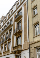 Fototapeta na wymiar Facade of a building with balconies in Strasburg