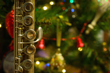 Old flute near a New Year tree