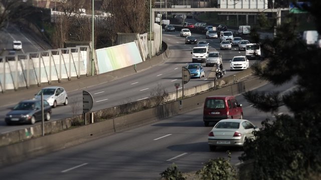 Time lapse busy highway traffic - 60fps. Time lapse of a busy highway traffic in the city of Paris, France - Full HD