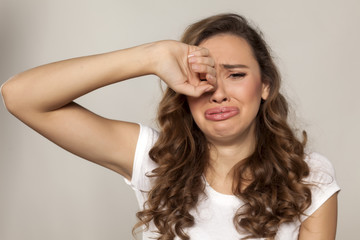 Crying girl with long hair