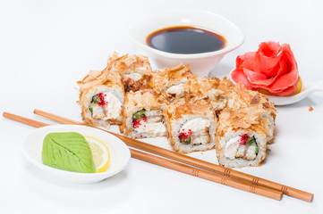 closeup roll sushi with chopsticks and wasabi (shallow DOF)