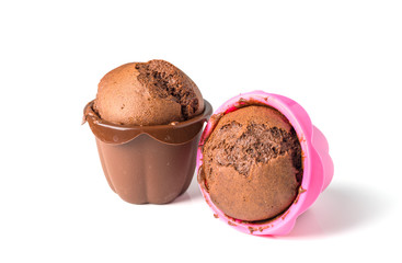 chocolate muffins with raisins isolated on white background