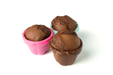 chocolate muffins with raisins isolated on white background