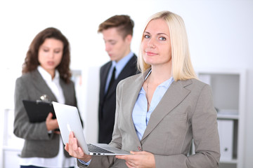 Fototapeta premium Beautiful cheerful smiling business woman