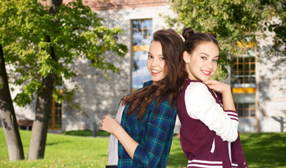 Fototapeta premium happy smiling pretty teenage girls over campus 