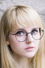 Portrait of young woman wearing glasses