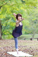 Japanese Woman Doing YOGA "lord of the dance pose"
