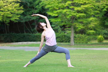 Japanese woman doing yoga