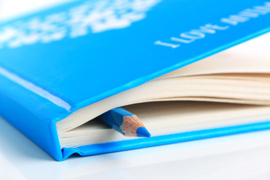 blue notebook isolated on white