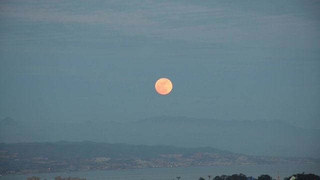 Moonrise through clouds fifth step