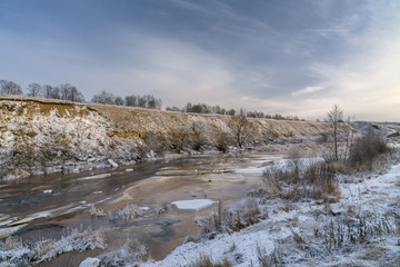Fototapeta na wymiar Tosna river in winter day