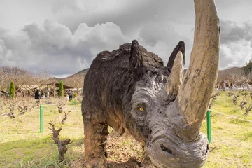 Zelfklevend Fotobehang  Prehistoric rhino portrait © Bill Anastasiou