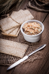 Homemade sandwiches with crisp bread, tuna and egg on a wooden t