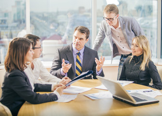 Business people working together in meeting room