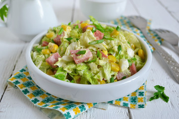 Salad with Chinese cabbage, ham and corn