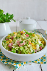Salad with Chinese cabbage, ham and corn
