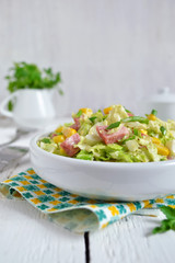 Salad with Chinese cabbage, ham and corn