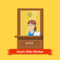 Classic bank teller window with a working clerk