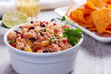 homemade vegetarian couscous with tomato corn beans green peas
