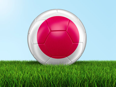 Soccer football with Japanese flag. Image with clipping path
