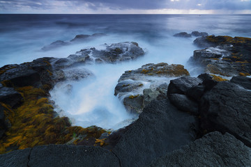 Misty waves crash on Hawai'i