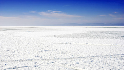 Fototapeta na wymiar Lake landscapes with snow on the ice