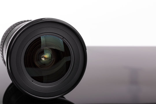 black photo camera lens with copy space