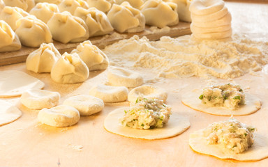 Central Asian traditional food. Preparation of the Uzbek dumplings - Manti