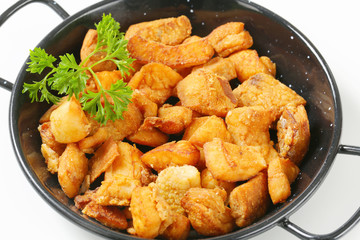 Crispy fried pork greaves