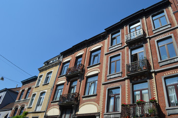 Rows of colourful authentic houses in a street in Brussels