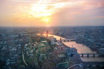 LONDON, UK - JANUARY 27, 2015:  London aerial view at dusk. River Thames and bridges