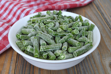Frozen green beans in a bowl