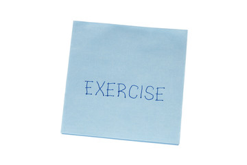 Sticky note with exercise written with pen