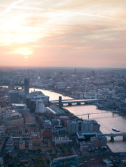 Fototapeta premium LONDON, UK - JANUARY 27, 2015: London aerial view at dusk. River Thames and bridges