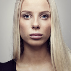 Close-up of a young woman with blonde hair