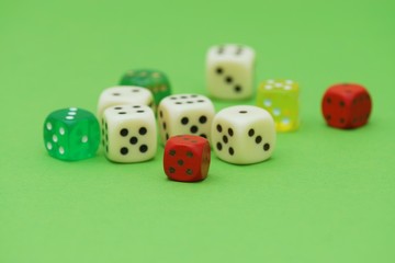  Colorful dice on green background