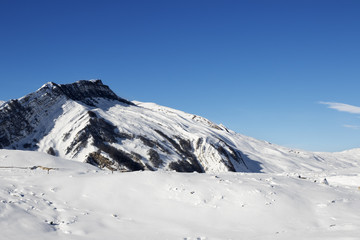 Fototapeta na wymiar Winter mountains after snowfall at sun day