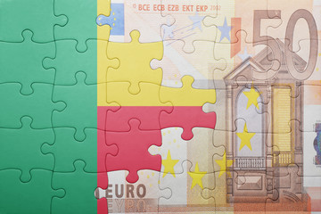 puzzle with the national flag of benin and euro banknote