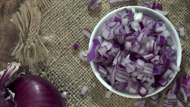 Rotating Red Onion Dices as not seamless loopable 4K footage