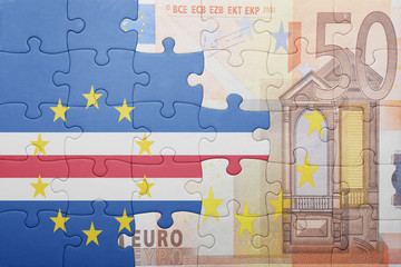 puzzle with the national flag of cape verde and euro banknote
