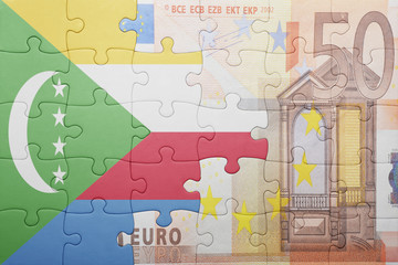 puzzle with the national flag of comoros and euro banknote