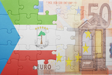 puzzle with the national flag of equatorial guinea and euro banknote