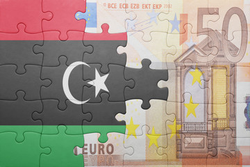 puzzle with the national flag of libya and euro banknote © luzitanija